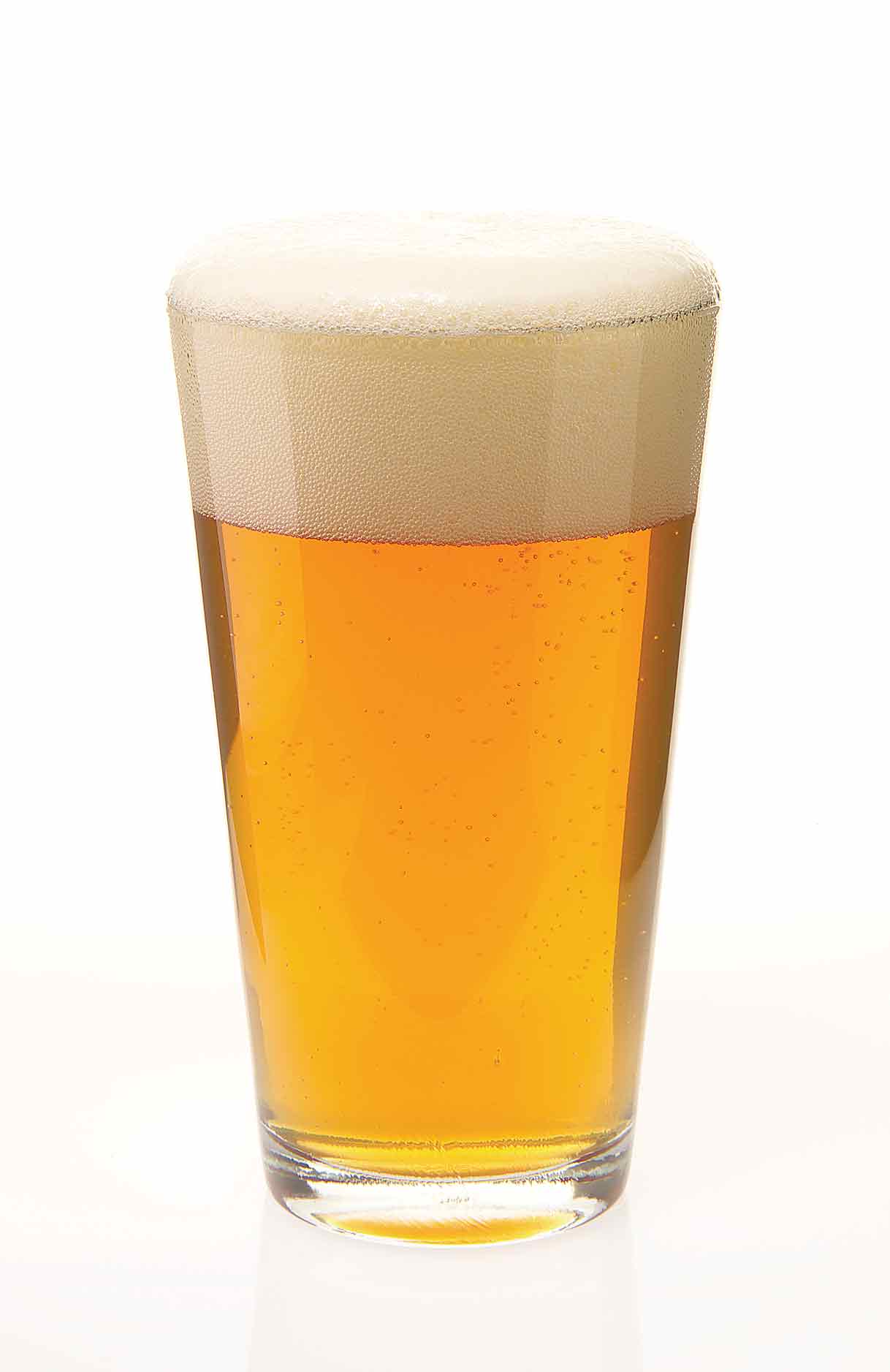 Shaker pint of american pale ale with a large foam head