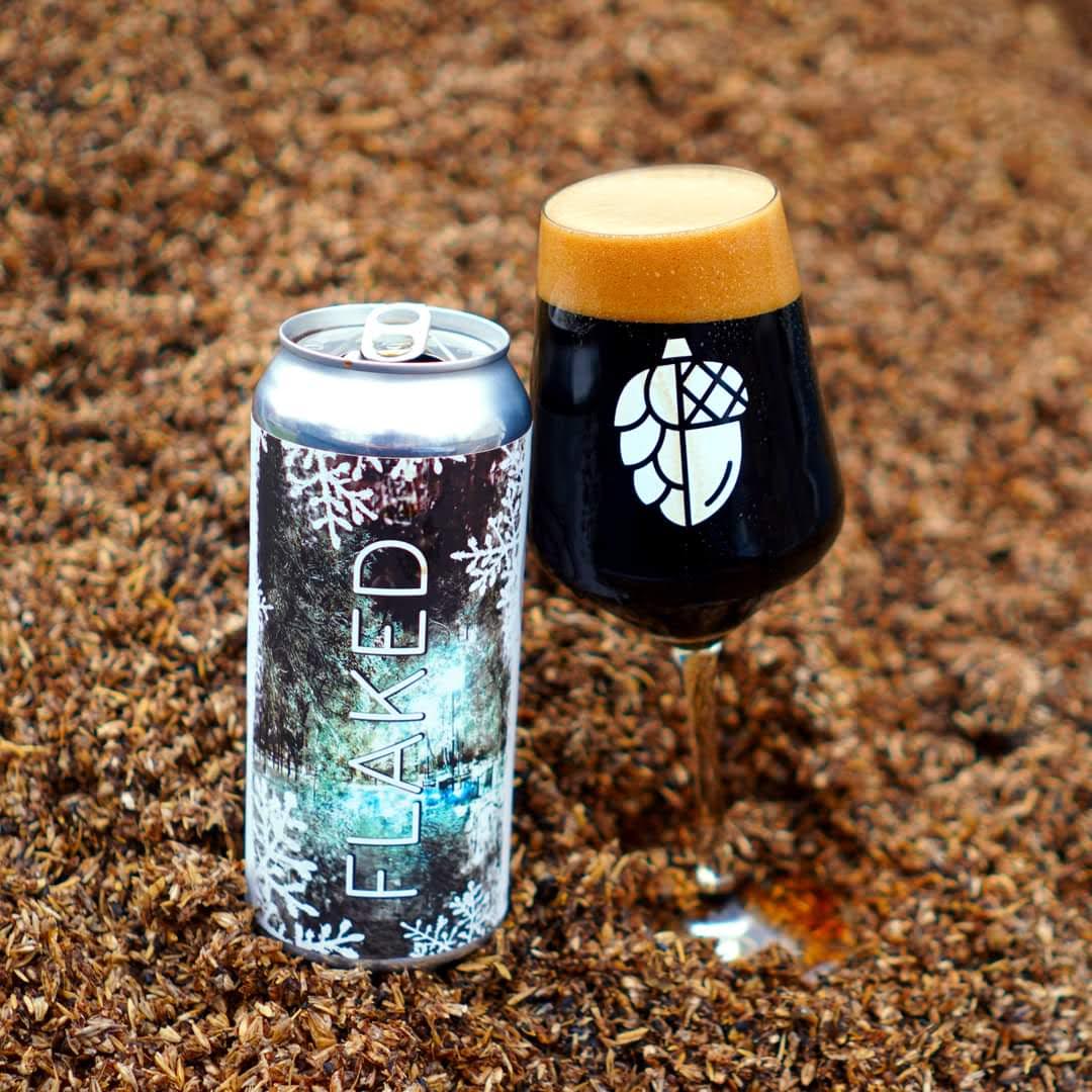sapwood cellars' flaked stout can and stemmed glass